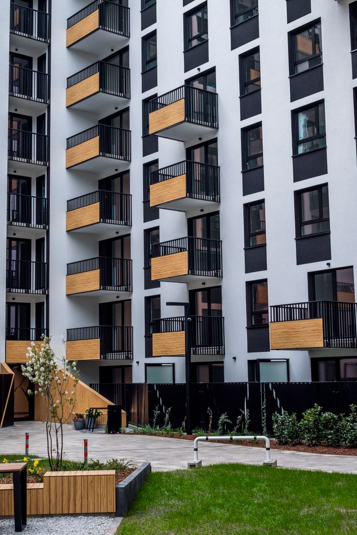 services-04 High-rise apartment building with balconies in a contemporary design.